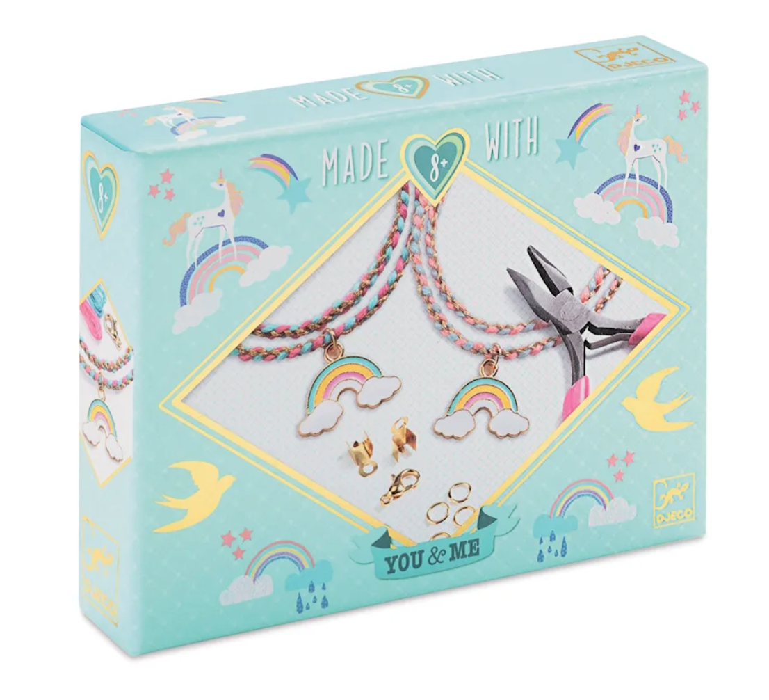 You & Me Rainbow Bracelet Set with colorful beads, rainbow charms, pliers, and illustrated cards in a playful packaging.
