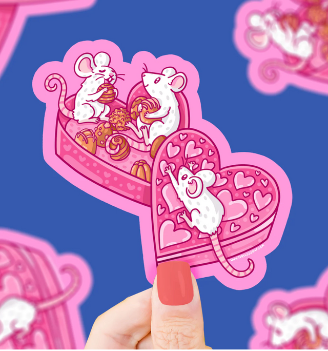 Mice in Chocolates Sticker shows cute mice enjoying chocolates from a heart-shaped box, weatherproof and scratch resistant.