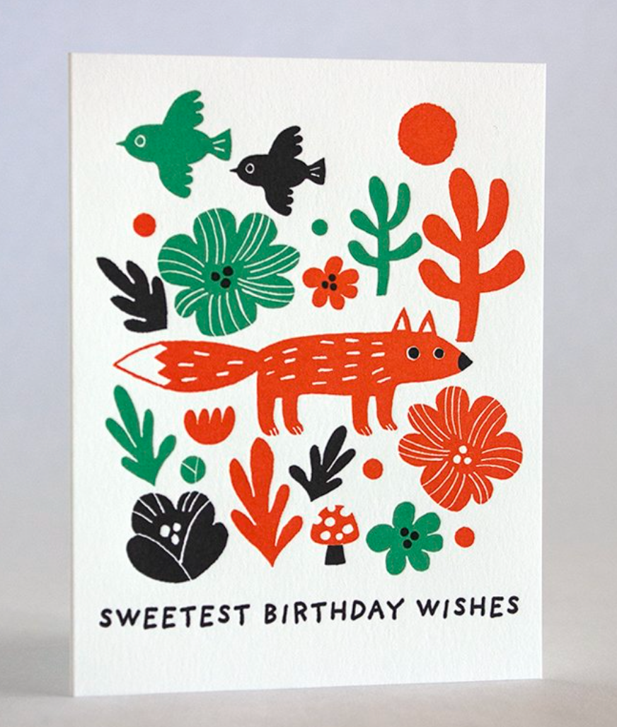 Fox and Flowers Birthday Card featuring a red fox, colorful flowers, and birds on recycled white paper.
