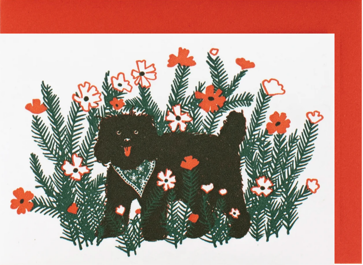 Mini Enclosure Card | Black Dog featuring a cute black dog illustration with flowers on a folded card and red envelope.