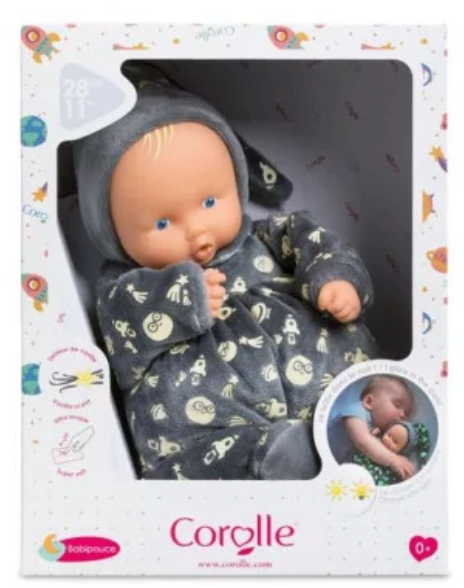 Babipouce Glow in the Dark doll in outer space pajamas with vinyl face, vanilla scent, and sewn-in name tag.