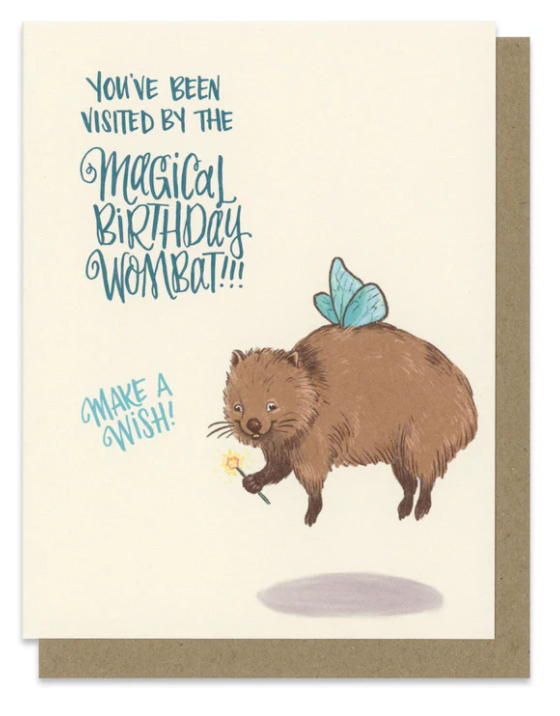 Magical Birthday Wombat Card with cute wombat holding a magic wand and butterfly wings on recycled paper with kraft envelope.