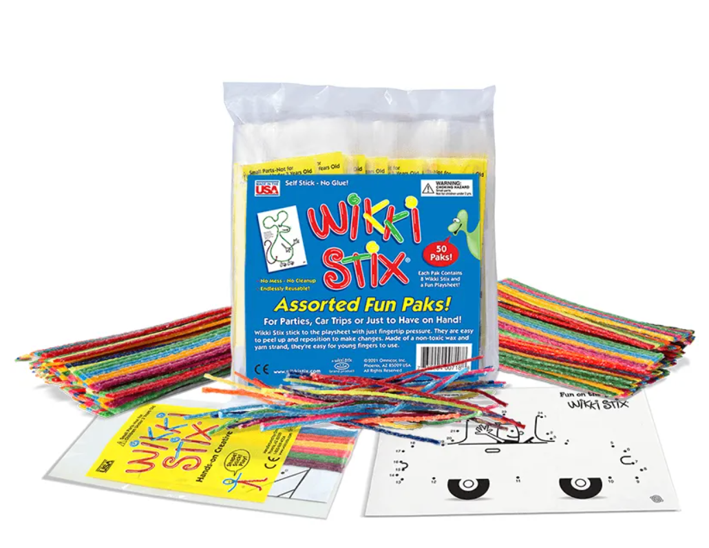 Assorted Fun Packs with colorful Wikki Stix, playsheets, and creative activities perfect for kids’ parties and travel.