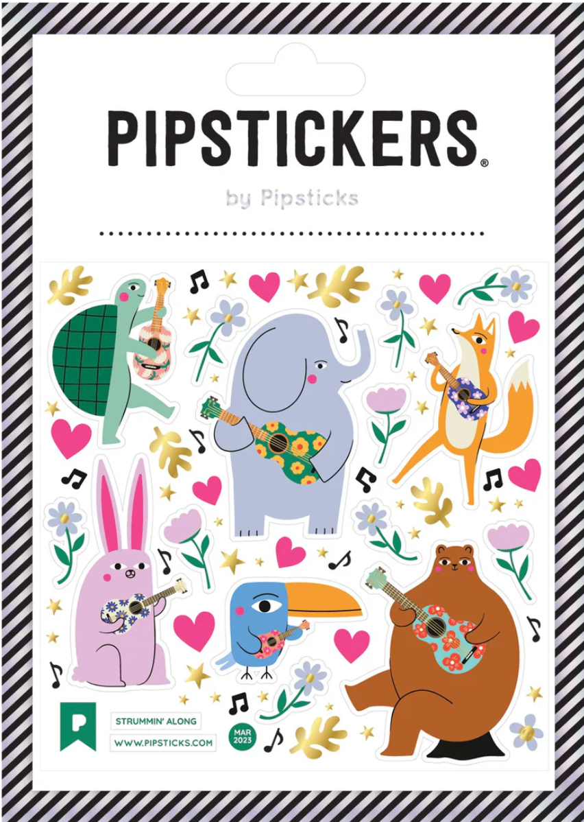 Strummin Along Stickers featuring playful animals with guitars in holographic silver foil on clear backing sheet.
