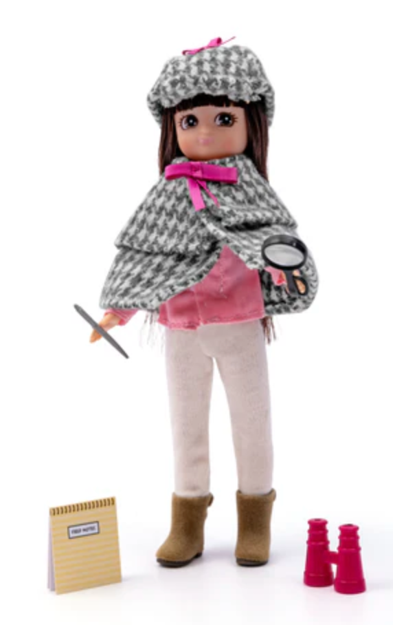 Lottie Mystery Solver Outfit with houndstooth cape and hat, pink top, cream trousers, boots, and detective accessories.