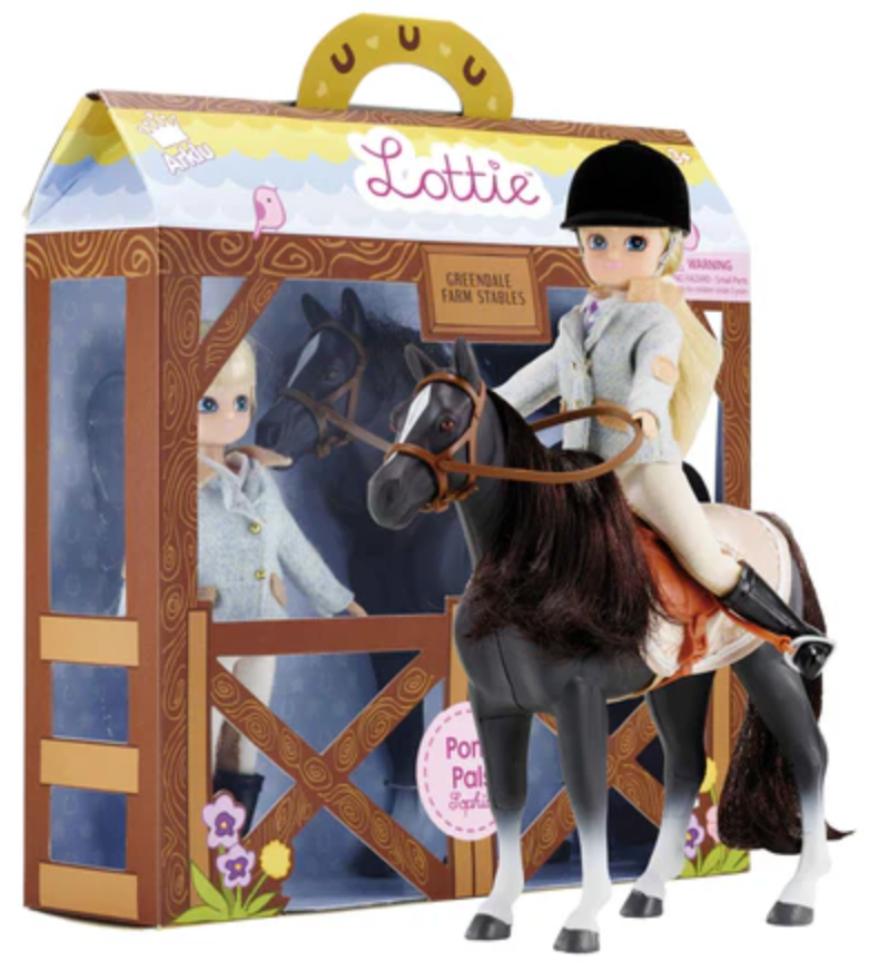 Lottie Pony Pals with Doll featuring a rider doll on a black pony with bridle and saddle in farm-style packaging.