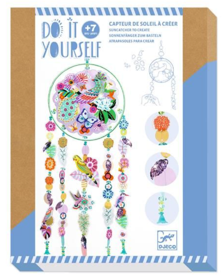 DIY Paradise Bird Suncatcher kit featuring colorful decorative shapes, beads, and ribbons for creative sun-catching fun.
