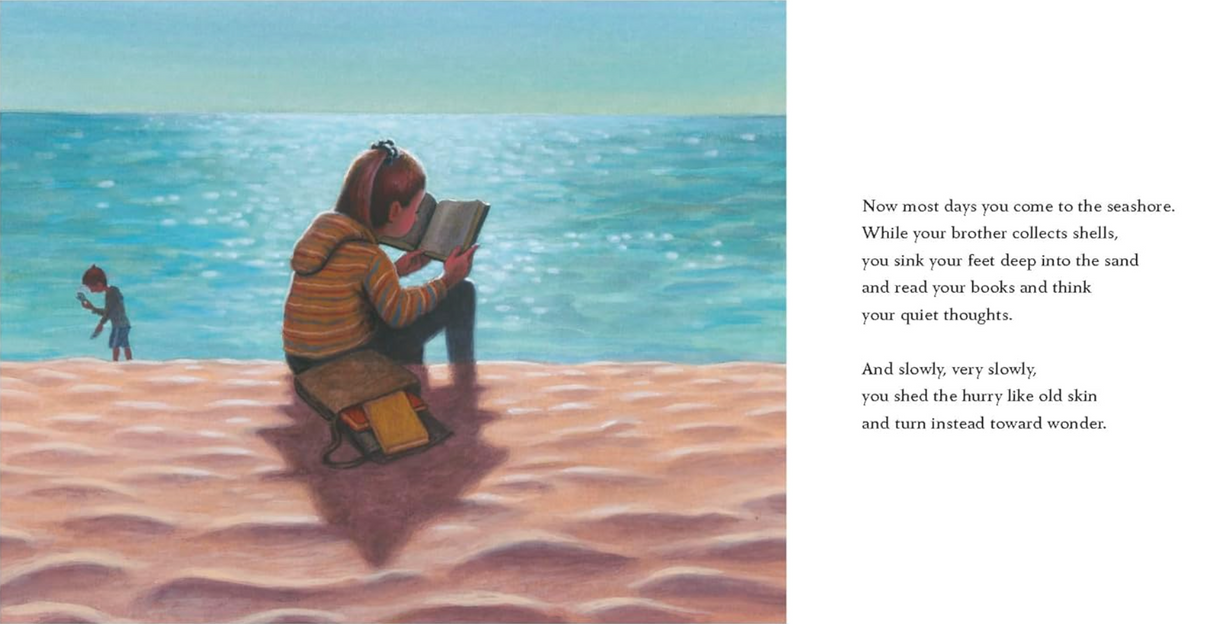 Home product image showing a child reading a book by the shimmering seashore with sandy textures and calm waves.