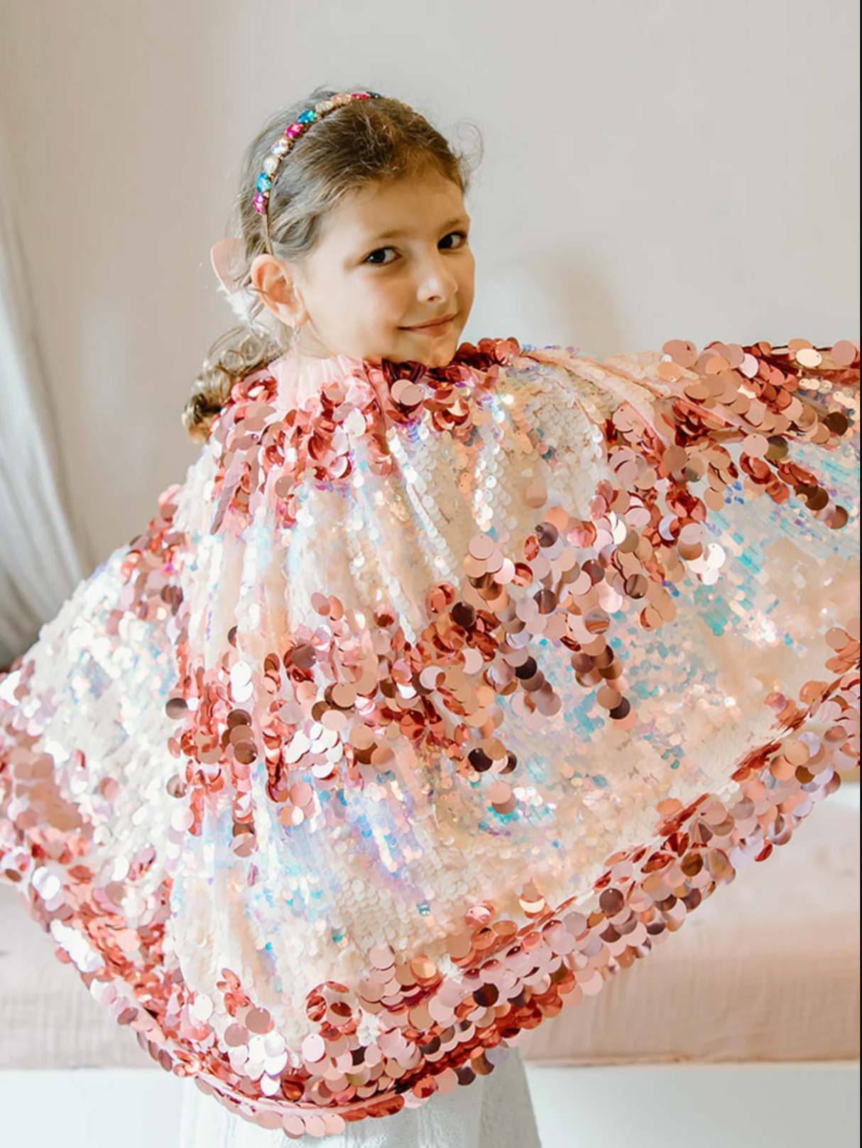 The 5th Avenue Pailette Cape | Pink with shimmering dark and light pink sequins and a delicate tulle collar.