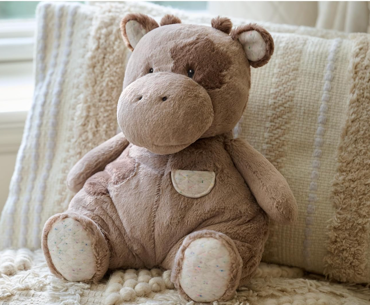 Oh So Snuggly Cow plush toy in light brown with quilted ears and feet, perfect for all ages and machine washable.