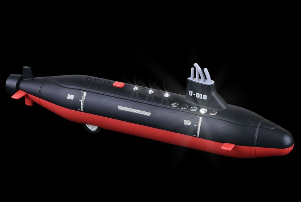 Submarine diecast pull back toy with lights and sounds, speeding across surfaces for kids ages 3 and up.