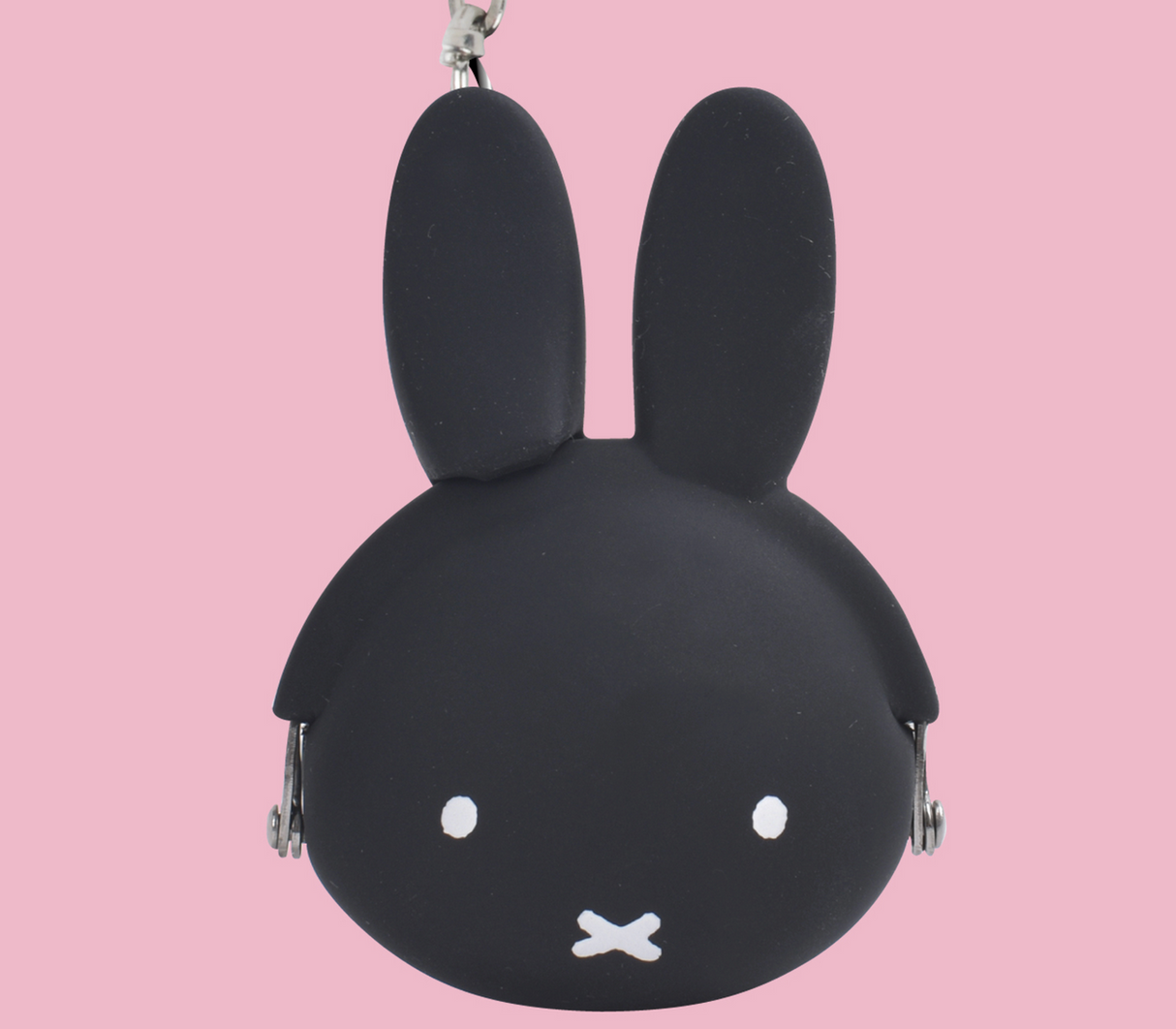 mimi POCHI BABY Miffy Pouch | Black mini silicon coin case with Miffy face and clip-open closure against pink background