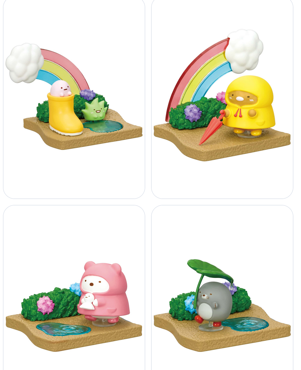 Re-Ment | Sumikkogurashi Walking on a Rainy Day Blind Box featuring adorable rainy day character scenes with rainbows and umbrellas.