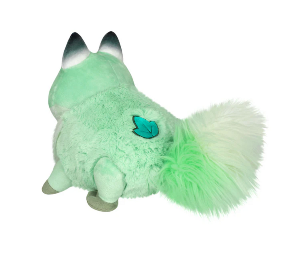 Leafy Fox Mini plush in soft green with a leaf detail on its back, perfect for woodland camouflage.