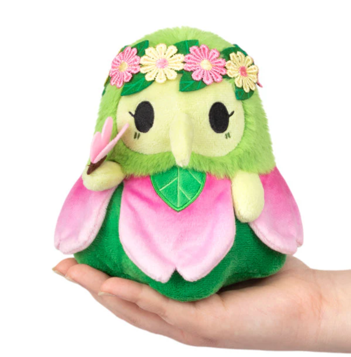 Alter Ego | Plague Doctor Nymph plush with green and pink petals and flower crown held in hand.