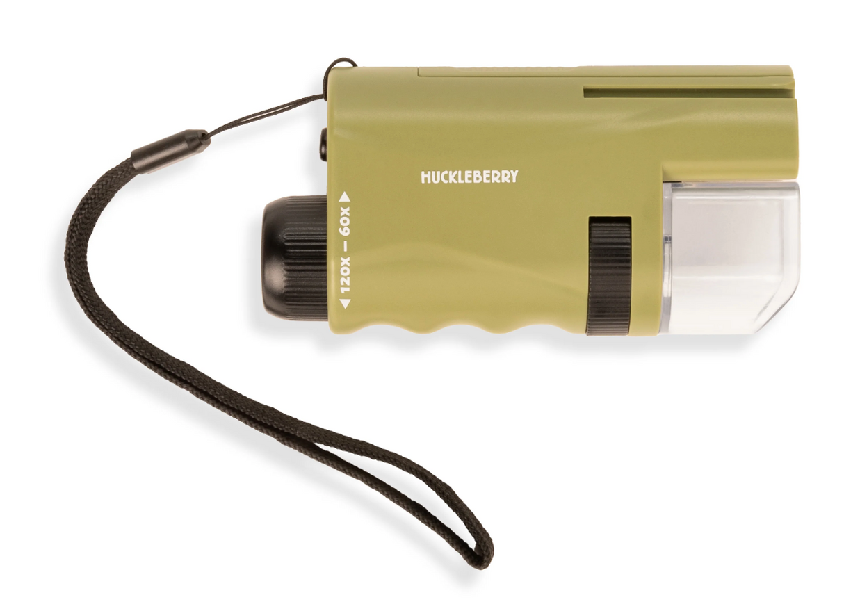 Huckleberry Pocket Microscope in green with adjustable zoom, LED light, and wrist strap for portable exploration up to 120x magnification.