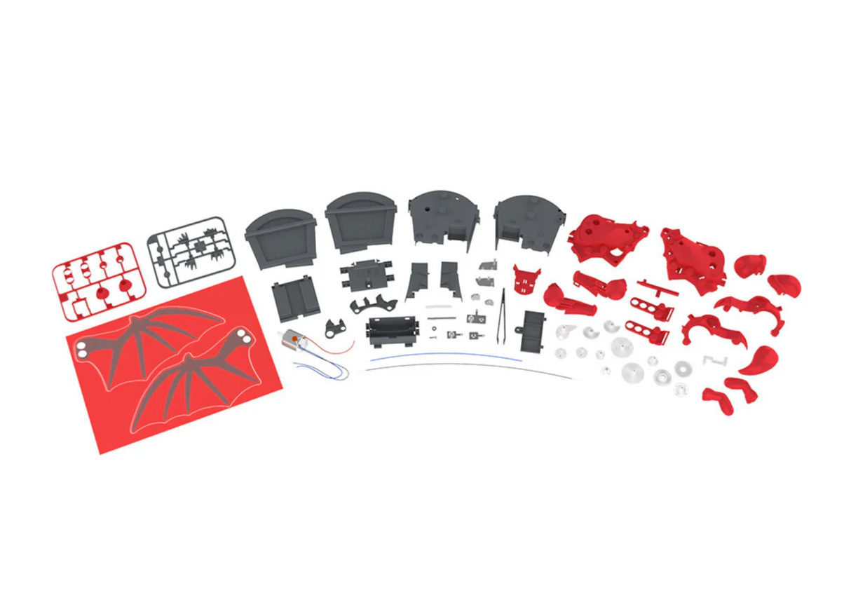 Robotic Dragon Bank Kit parts laid out for assembly, including red wings, grey body pieces, gears, and motor components.