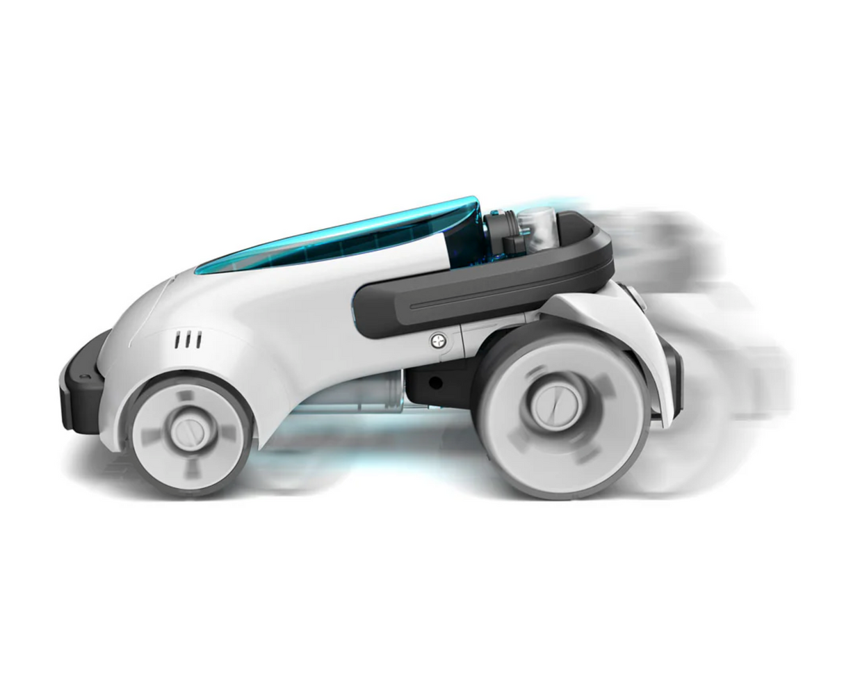 Air-Power Turbo Racer air-powered race car in motion with sleek design and visible air propulsion system.