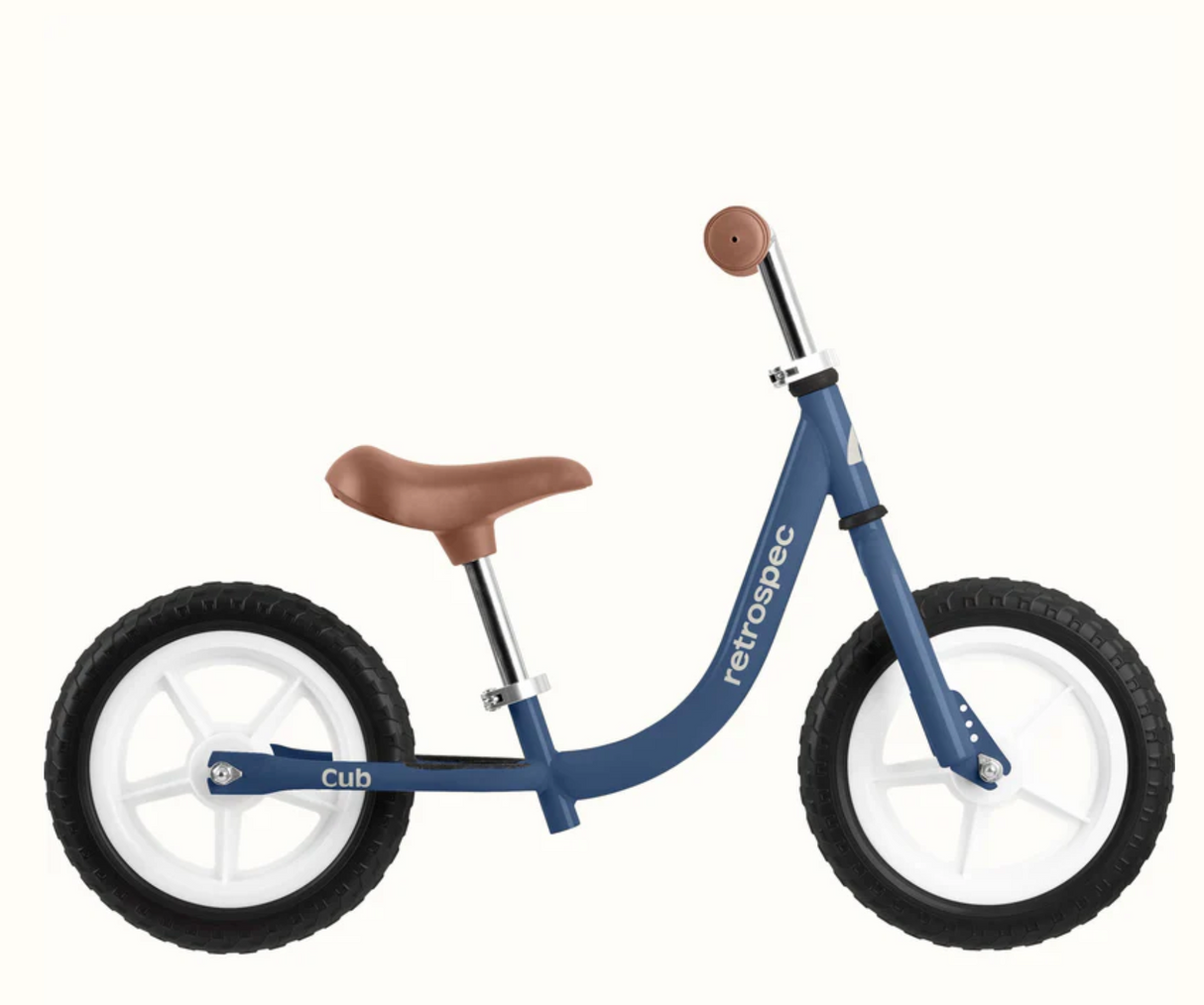 Cub Balance Bike | Navy with lightweight frame, adjustable seat and handlebars, and airless tires for safe balancing.