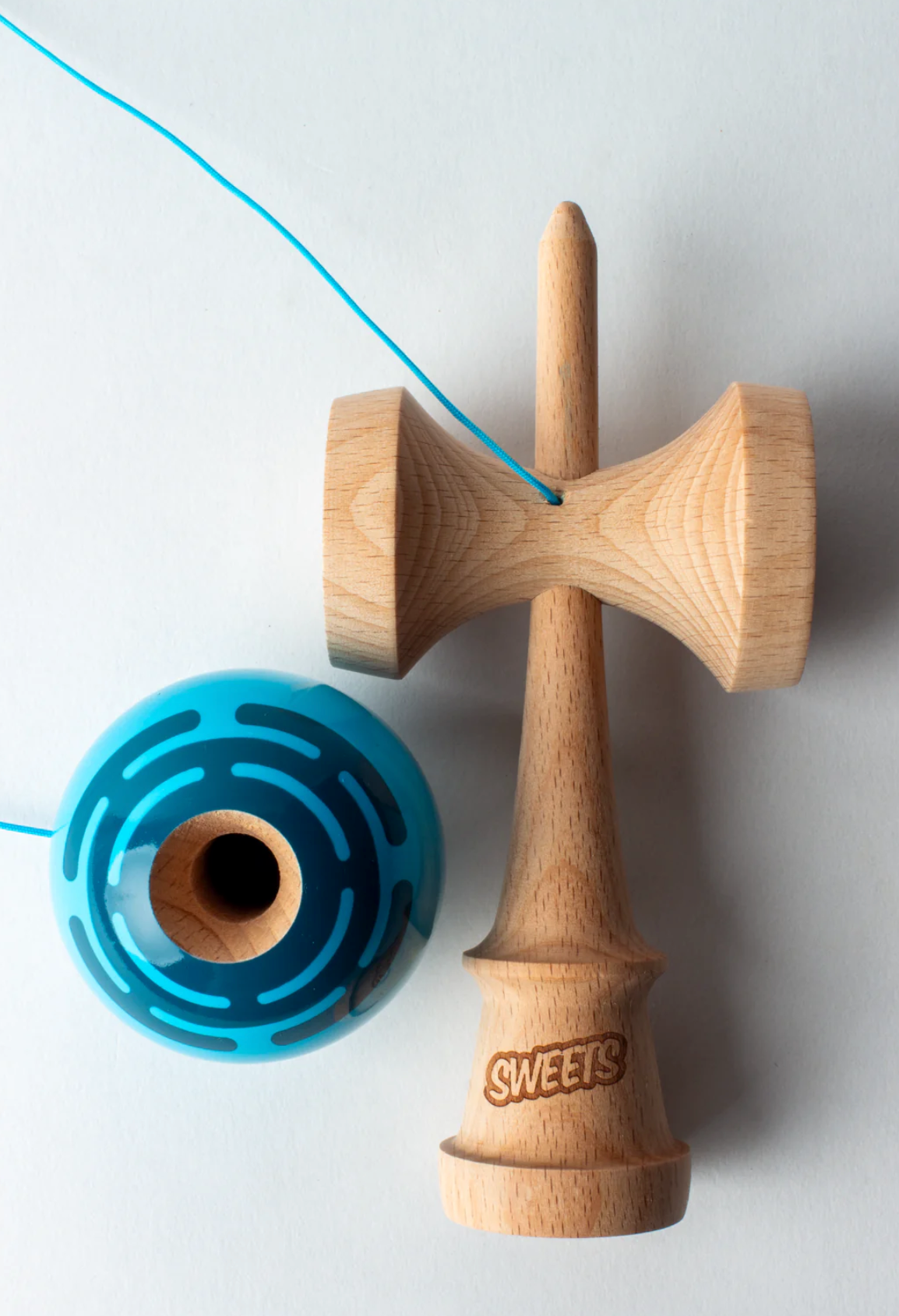 Kendama Prime Radar | Blue with signature Radar mark, Sticky Clear tama, and matching blue string on a natural wooden BOOST ken.