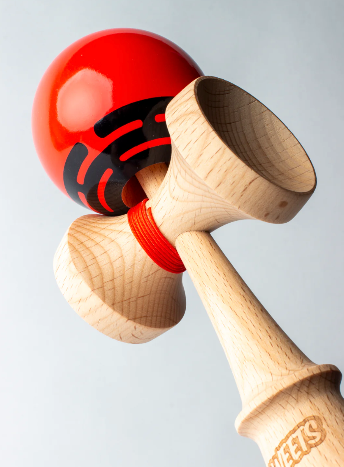 Kendama Prime Radar | Red with bright red tama, black Radar mark, wooden BOOST ken, and matching red string.