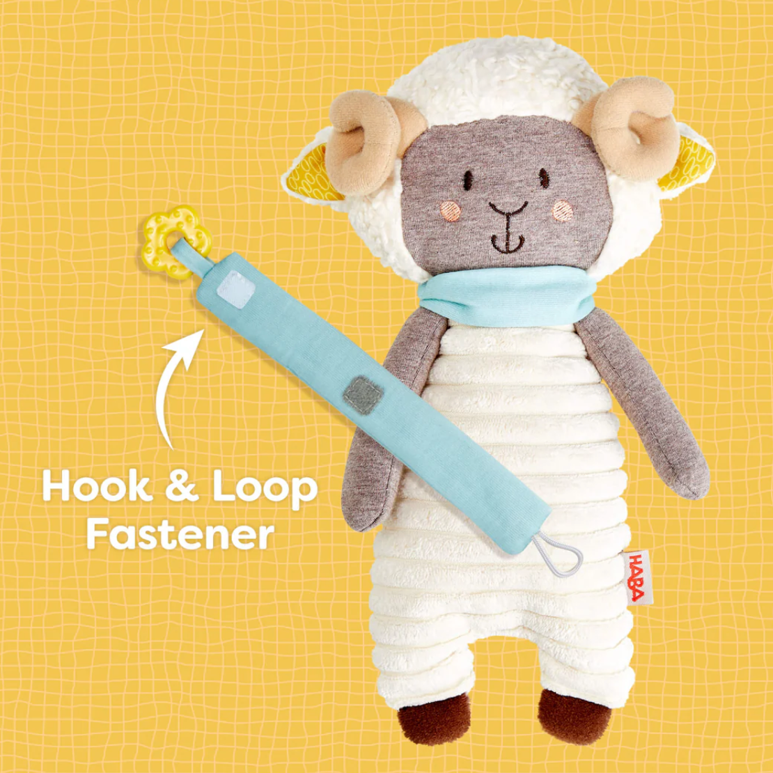Woolbert the Ram Pacifier Holder soft lamb plush with hook and loop fastener for baby pacifiers and toys.