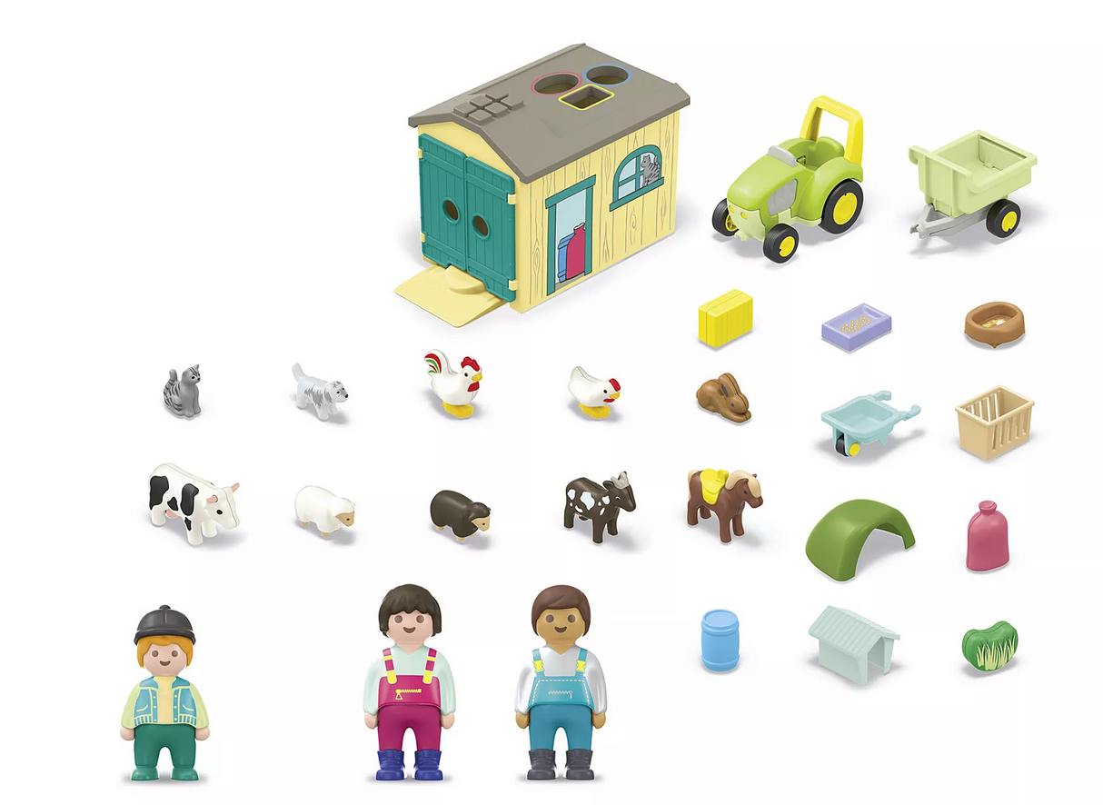 Junior | Farm Adventure with Tractor playset showing farm family, tractor with trailer, barn, animals, and farm accessories.