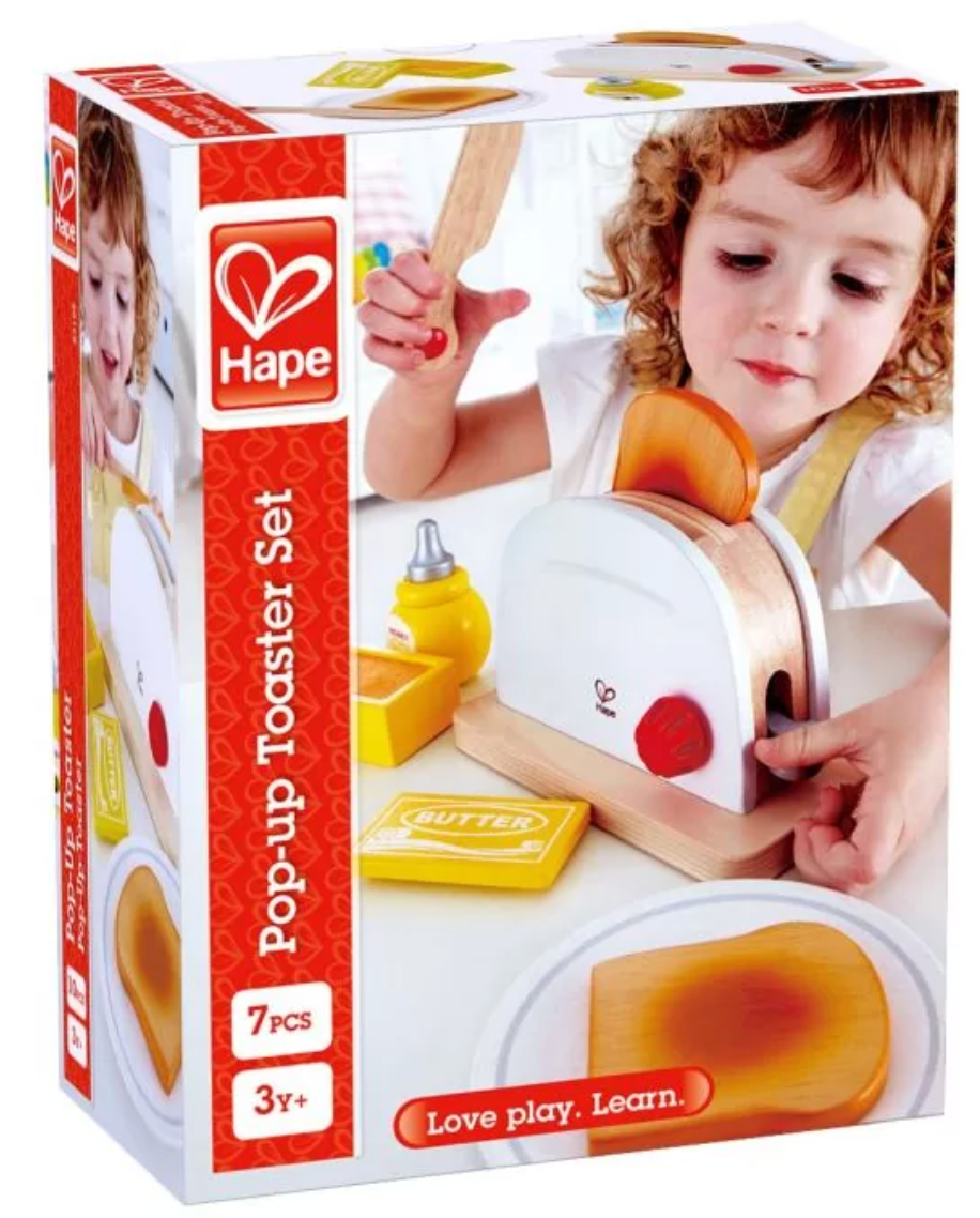 Pop-Up Toaster Set with wooden toaster, toast slices, butter, honey bear, and child playing in toy kitchen.