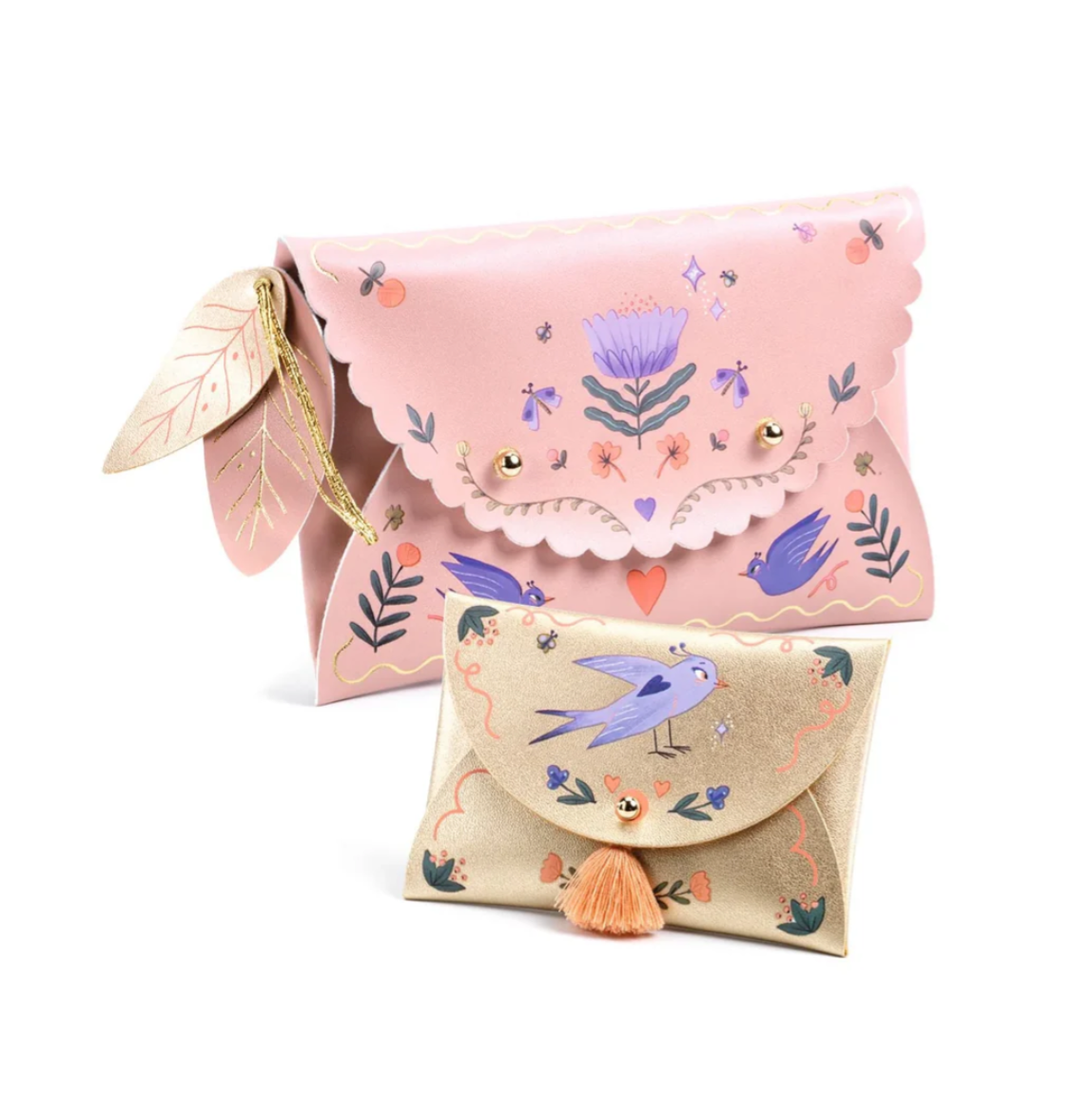 DIY Sweet Fashionista Pouches featuring two decorated faux leather purses with floral and bird designs and pompom detail.
