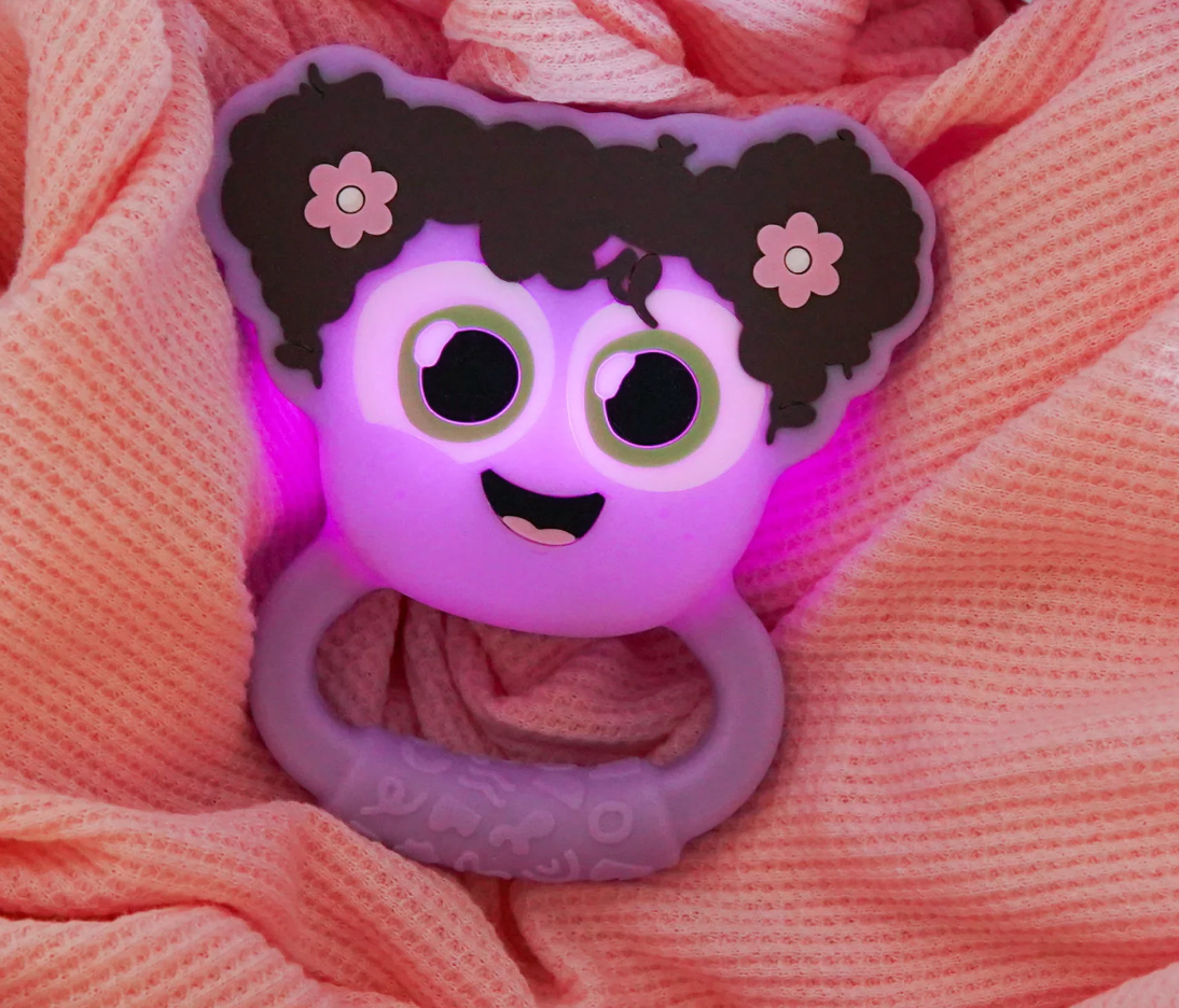 Glo Pals Light Up Rattle | Purple glowing baby rattle with easy-grip handle for sensory and motor skill development.