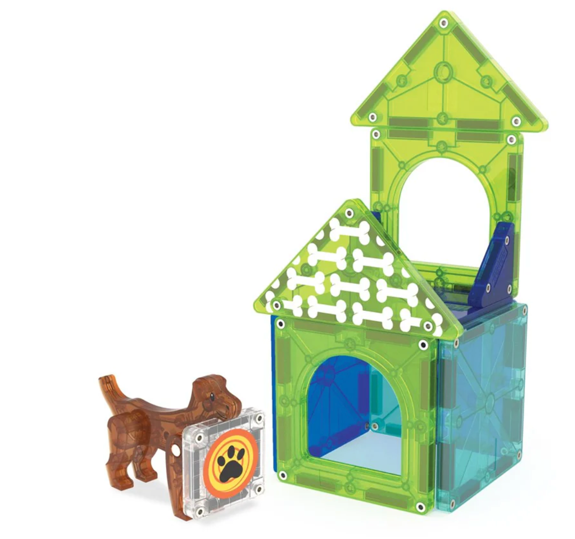 Magnatiles Dog House 13pc with translucent green dog house, brown dog figure, and decorative bone and paw pieces.