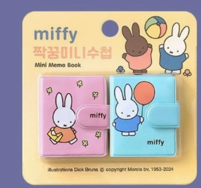 Two small Miffy-themed mini memo books with colorful covers featuring Miffy illustrations on pink and blue backgrounds