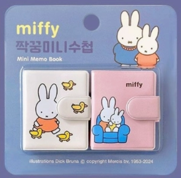 Two Miffy mini memo books in white and pink with cute character illustrations and snap closures in packaging