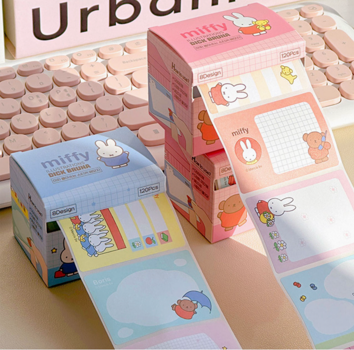 Two Miffy Pull-Out Sticky Note Rolls with colorful cute designs displayed on a desk near a keyboard