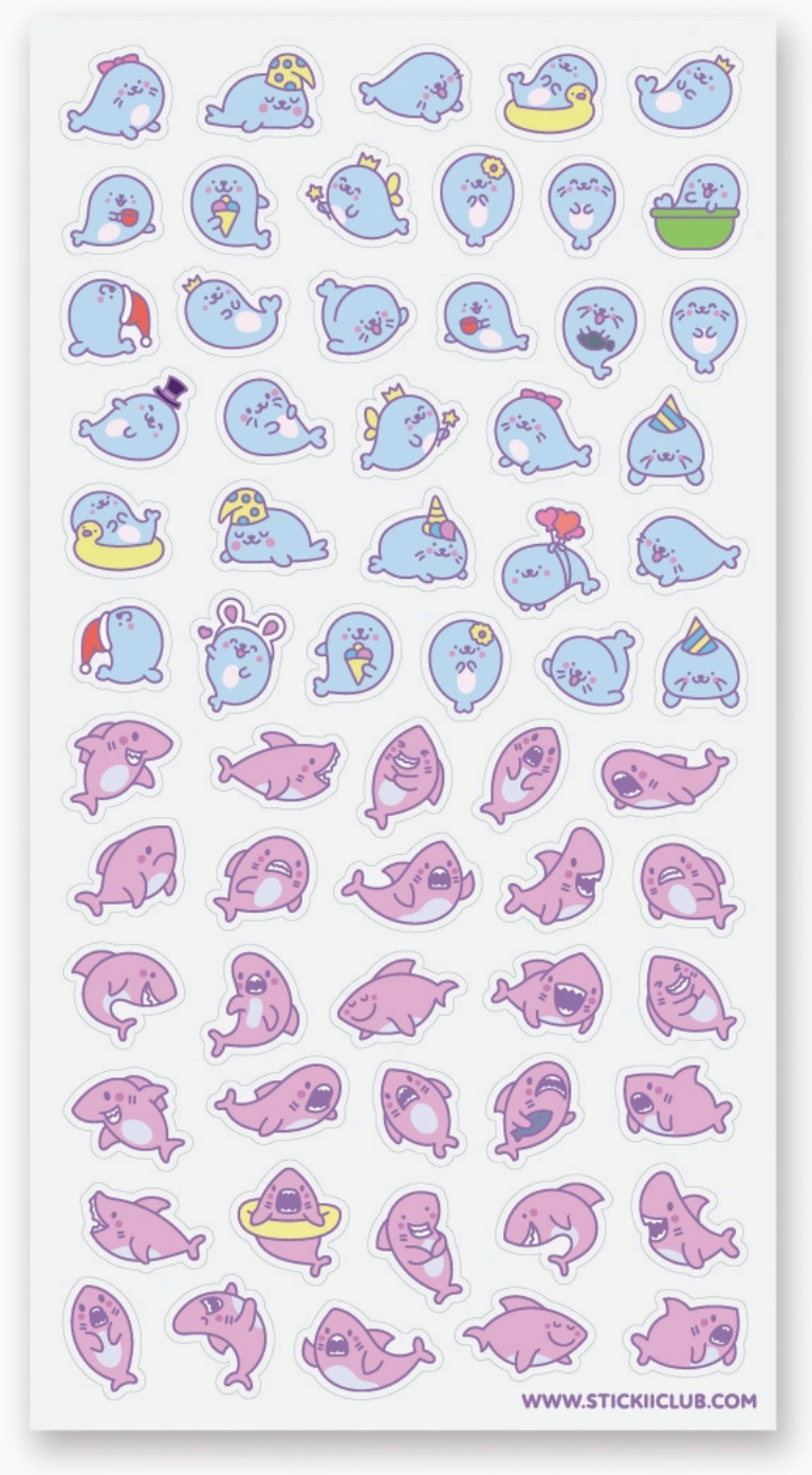 Sheet of kawaii style blue seal and pink shark stickers with playful expressions and cute accessories