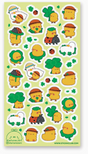 Sheet of Lucky Duckies stickers featuring cute yellow ducks with clovers, ladybugs, and playful hats on a light green background