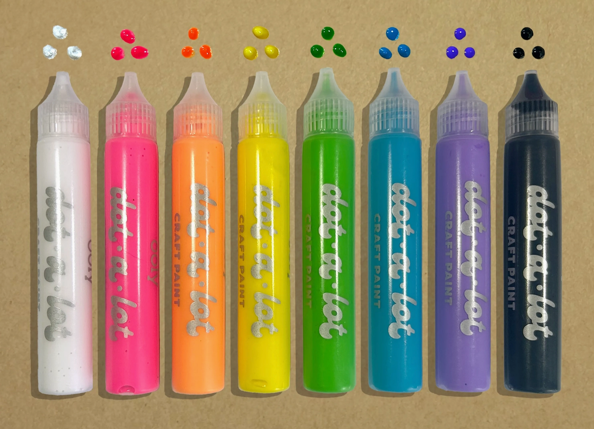 Eight vibrant Dot-A-Lot dimensional craft paint bottles with matching colorful dots on a brown background