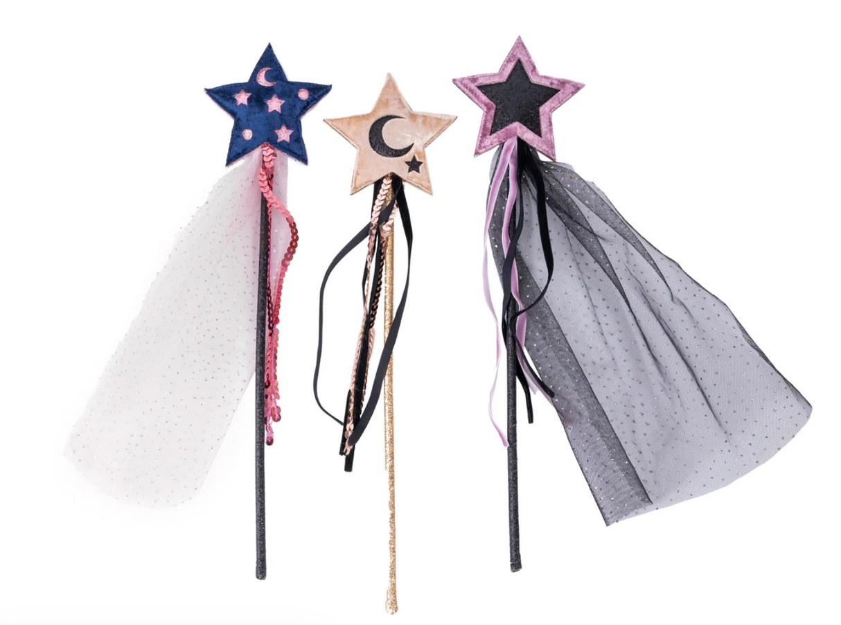 Three velvet star wands with flowing sheer capes and hanging sequin ribbons in night sky inspired colors