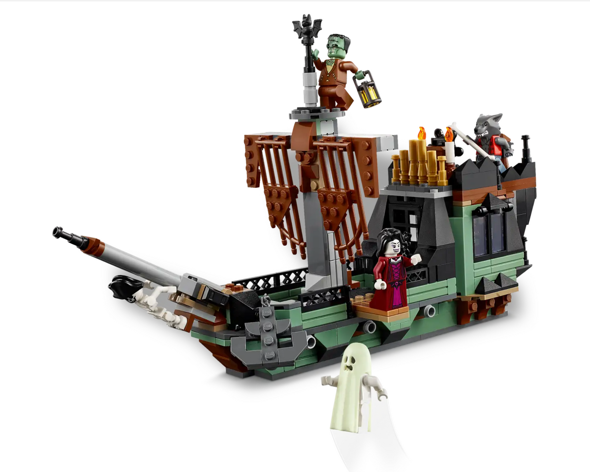 Detailed LEGO haunted ship with spooky minifigures including a ghost and monster holding a lantern.