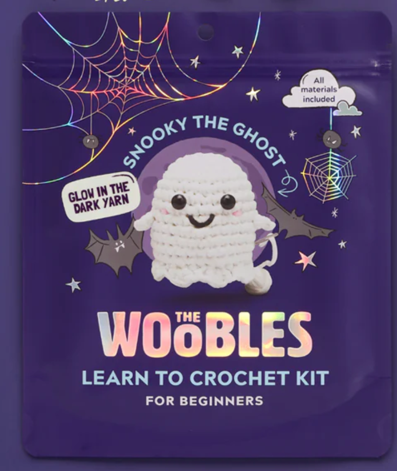 Packaging of The Woobles crochet kit featuring Snooky the Ghost with glow in the dark yarn and beginner-friendly instructions
