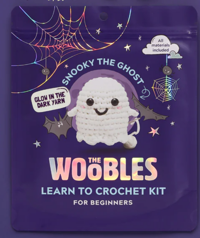 Packaging of The Woobles crochet kit featuring Snooky the Ghost with glow in the dark yarn and beginner-friendly instructions