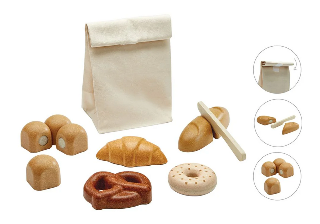 Wooden play bread set with bagel, rolls, pretzel, croissant, cuttable baguette, knife, and fabric storage bag