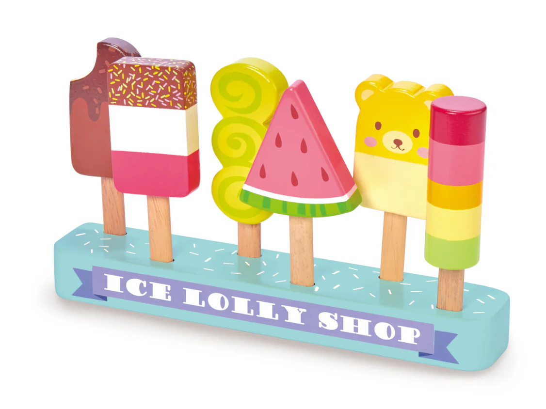 Colorful wooden ice lollies in various shapes and flavors on a blue stand labeled Ice Lolly Shop for imaginative play.