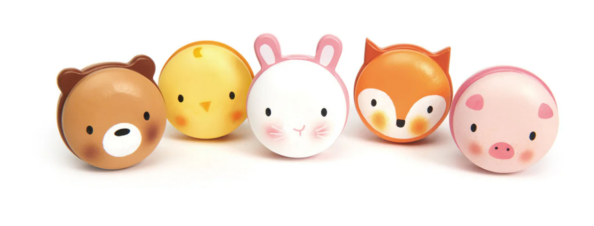 Set of five colorful wooden animal macarons shaped like a bear, chick, bunny, fox, and piglet with different colored fillings.