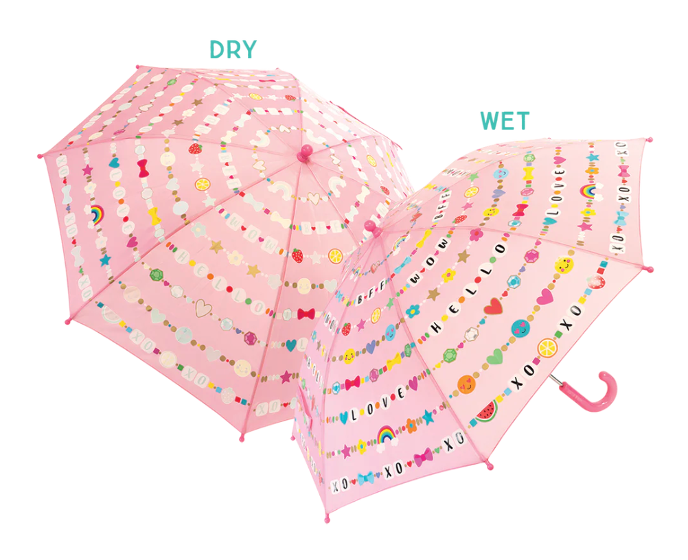 Pink friendship umbrella showing colorful icons when wet and plain white shapes when dry with a curved handle for kids aged six plus