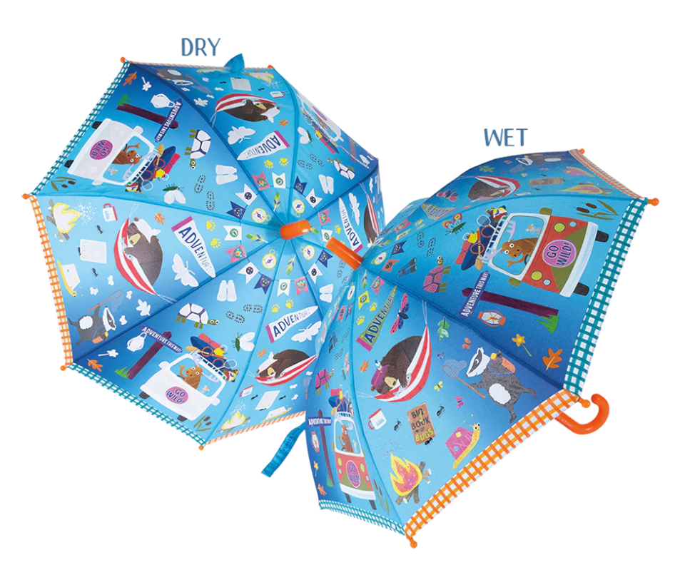 Children's umbrella showing color change from white sections to vibrant in rain with fun adventure animal designs