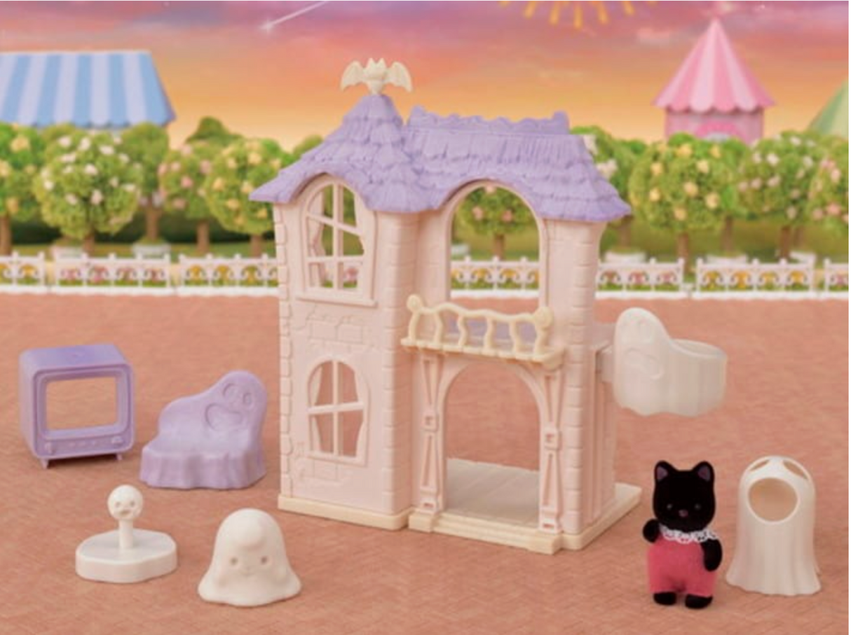 Spooky Surprise House playset with ghost figure, black cat, elevator, furniture, and ghost costume pieces for kids.