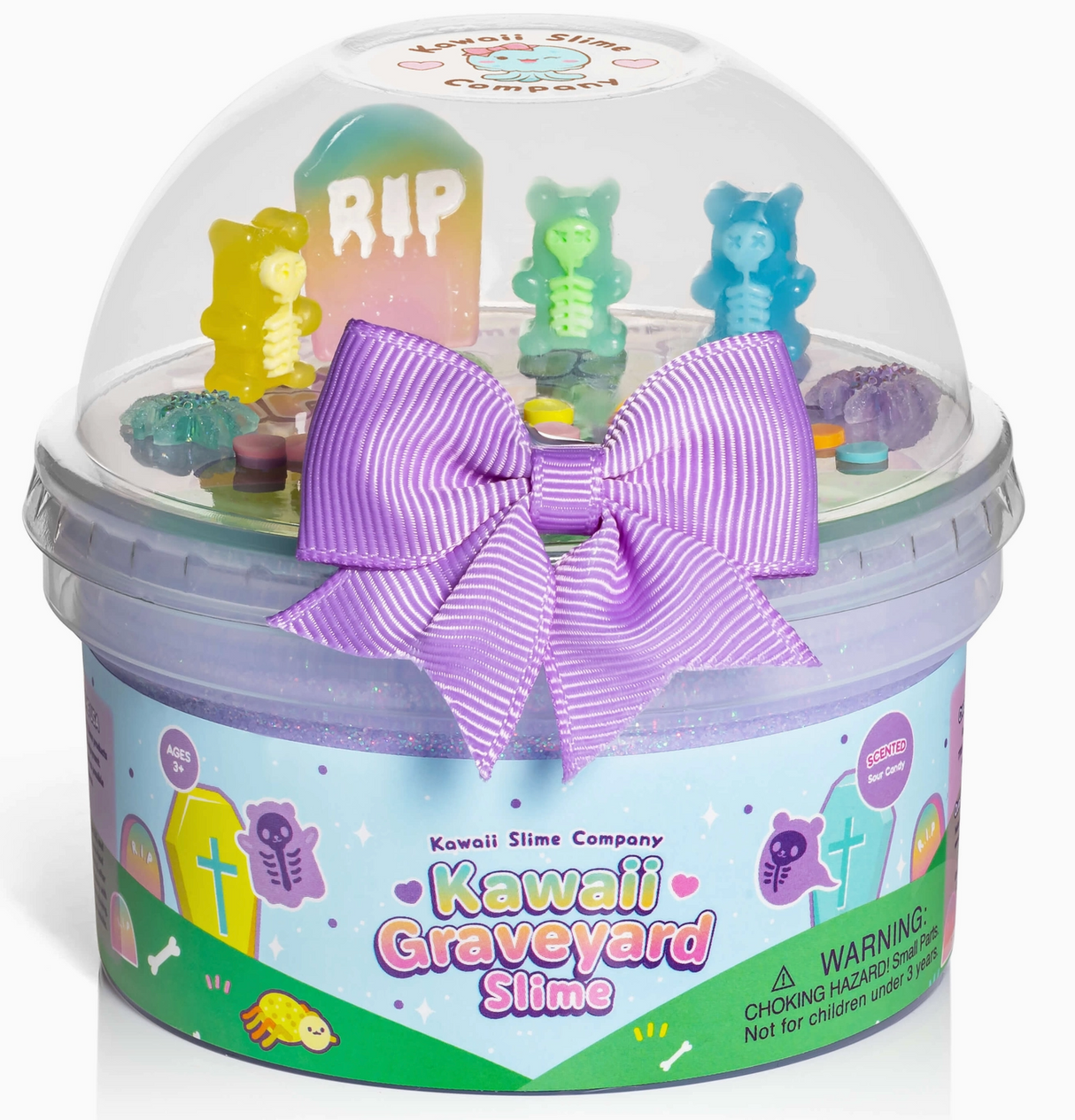 Container of pastel purple slime with colorful graveyard-themed decorations and a large purple bow on the lid