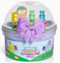 Container of pastel purple slime with colorful graveyard-themed decorations and a large purple bow on the lid