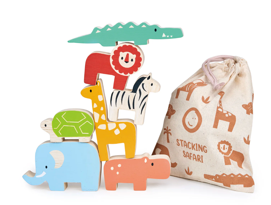 Wooden stacking safari animals balanced beside an illustrated drawstring storage bag for kids ages 18 months and up